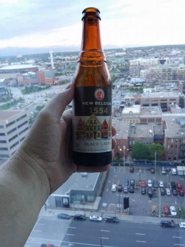 Enjoying-New-Belgium-1554-Black-Lager-from-the-16th-floor-of-the-Four-Seasons-in-Denver-awesome-views-Taste-the-coffee-chocolate-and-spices-in-the-beer.